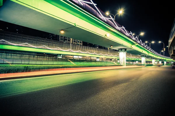 Light traces on traffic junctions at night — Stock Photo, Image