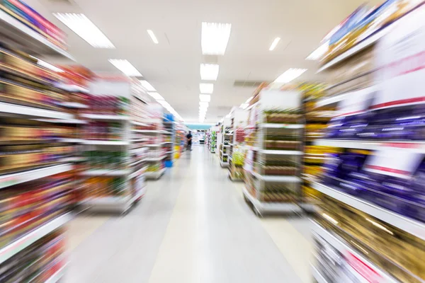 Empty supermarket aisle,motion blur — Stock Photo, Image