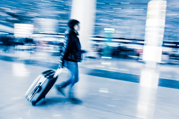 Rozmycie ruchu pasażerskiego w lotnisko w Pekinie, — Zdjęcie stockowe