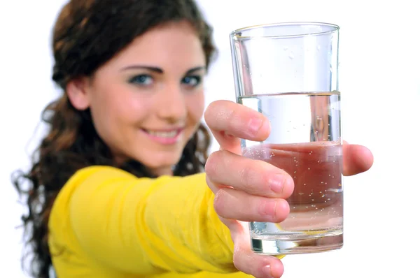 Portrait of attractive caucasian smiling woman isolated on white studio shot drinking water — Stock Photo, Image