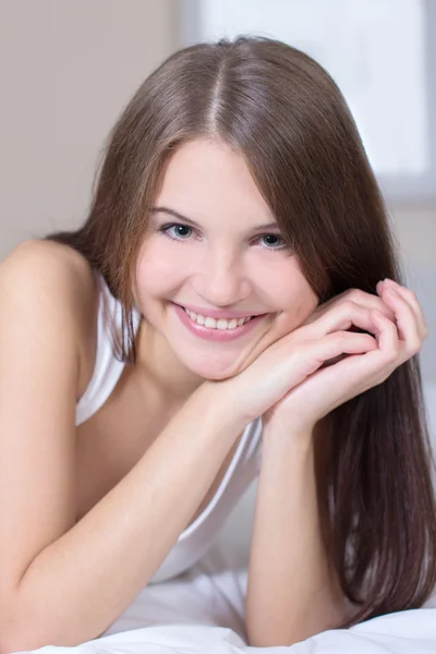 Girl on the bed — Stock Photo, Image