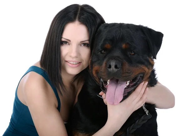 Женщина с собакой ротвейлера — стоковое фото
