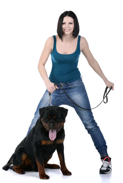 Kobieta z psa rottweiler — Zdjęcie stockowe