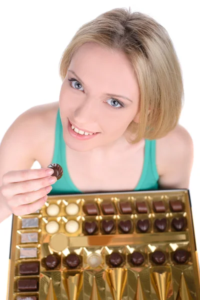 Девушка и конфеты — стоковое фото