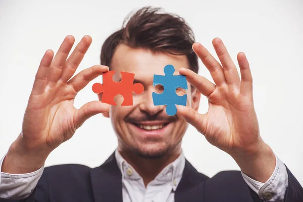 Handsome Man Suit Trying Connect Puzzle Pieces White Background — Stock Photo, Image