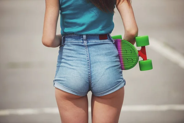 Young Woman Holding Skateboard Her Hand Back View Close — Stock Photo, Image