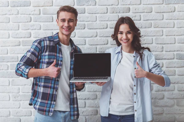 Young Beautiful Couple Keep Laptop His Hands Showing Thumb Background — Stock Photo, Image