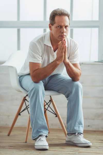 Thoughtful Middle Aged Man Casual Clothes Sitting Chair Window Home — Stock Photo, Image