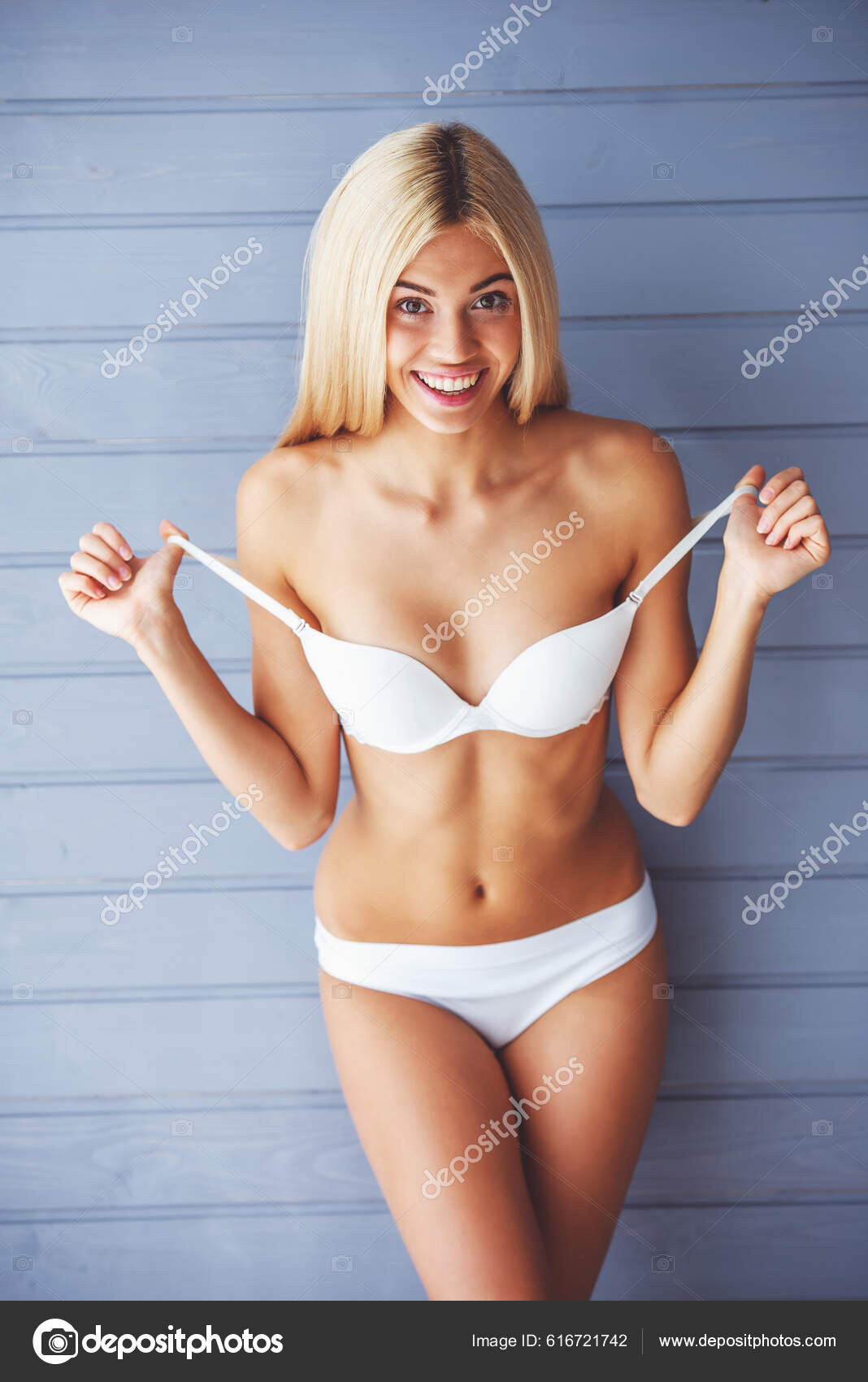 Beautiful Slim Blonde Girl White Underwear Pulling Her Bra Straps Stock  Photo by ©GeorgeRudy 616721742