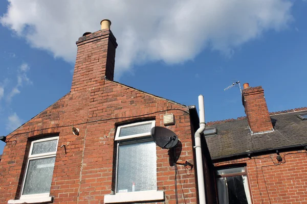 House chimney and satellite dish — Stock Photo, Image