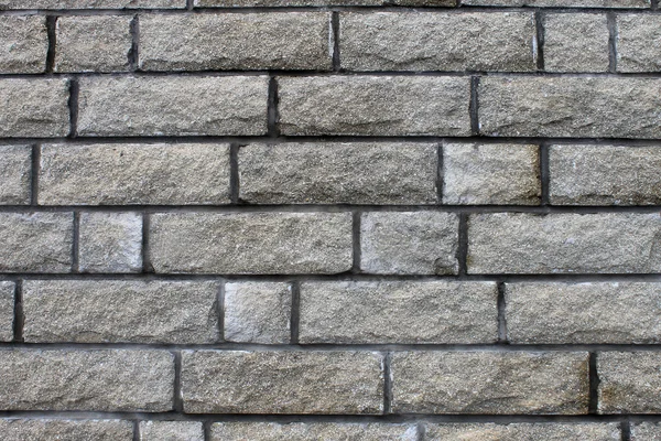 Ściana z szarej cegły — Zdjęcie stockowe