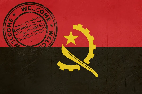 Vítejte v Angole vlajku s pas razítkem — Stock fotografie