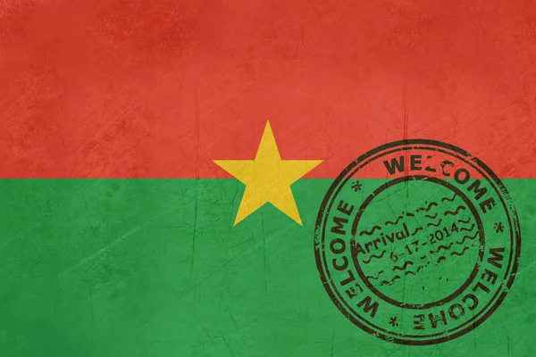 Welcome to Burkina Faso flag with passport stamp — Stock Photo, Image