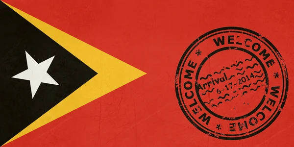 Willkommen in East Timor Flagge mit Passstempel — Stockfoto