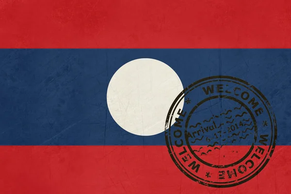 Willkommen in Laos Flagge mit Passstempel — Stockfoto