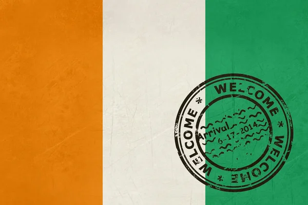 Welcome to the Ivory Coast flag with passport stamp — Stock Photo, Image