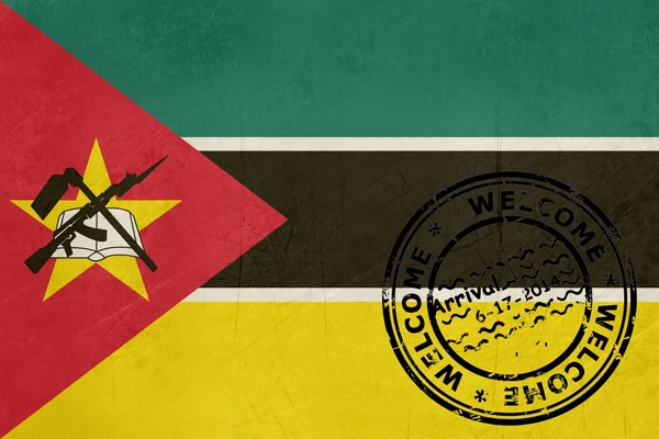 에 오신 것을 환영 합니다 여권 스탬프와 모잠비크 깃발 — 스톡 사진