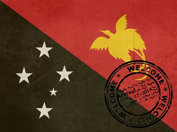 パスポートのスタンプとパプア ニューギニアの旗へようこそ — ストック写真
