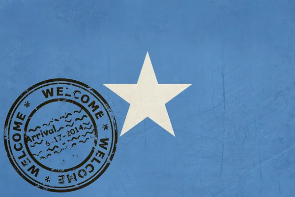ยินดีต้อนรับสู่ธงโซมาเลีย พร้อมตราพาสปอร์ต — ภาพถ่ายสต็อก