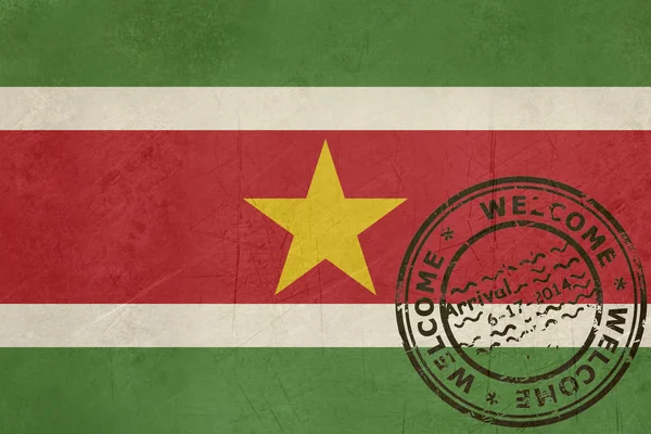 Bem-vindo ao Suriname bandeira com carimbo de passaporte — Fotografia de Stock