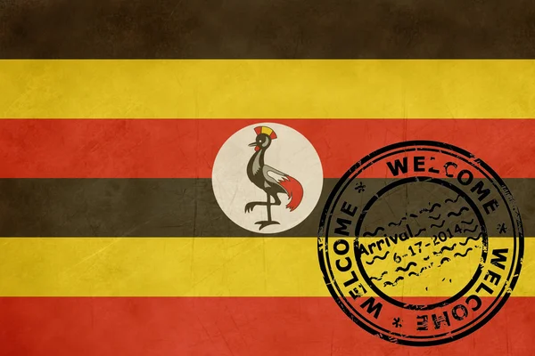 Willkommen in Uganda Flagge mit Passstempel — Stockfoto