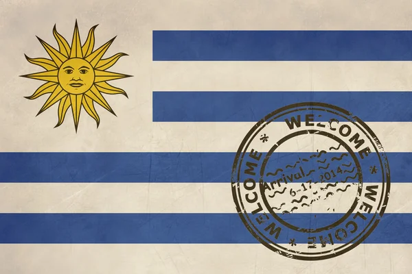 Välkommen till uraguay flagga med pass stämpel — Stockfoto