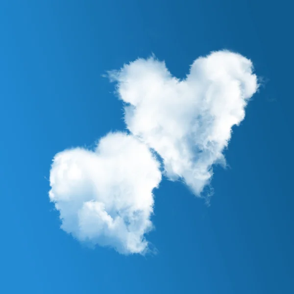 Two heart-shaped clouds on blue sky — Stock Photo, Image