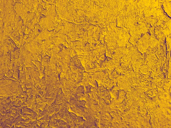 Textura staré zdi popraskané zlatou barvou. — Stock fotografie