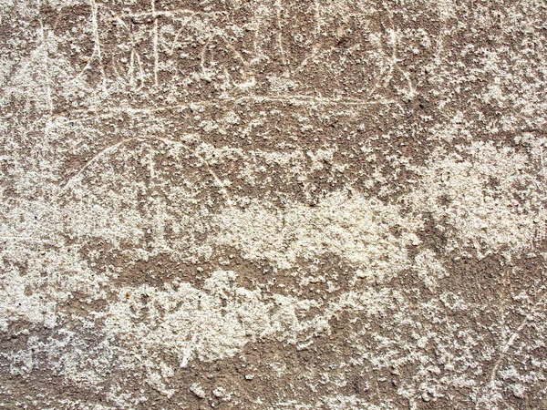 Textura de parede velha com uma pintura rasca . — Fotografia de Stock