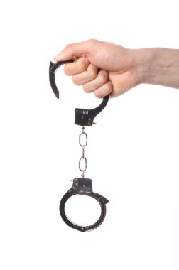 Hand wearing handcuffs clipart