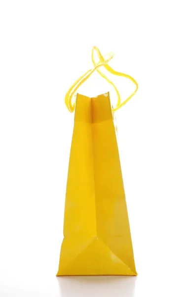 Yellow shopping bag — Stock Photo, Image