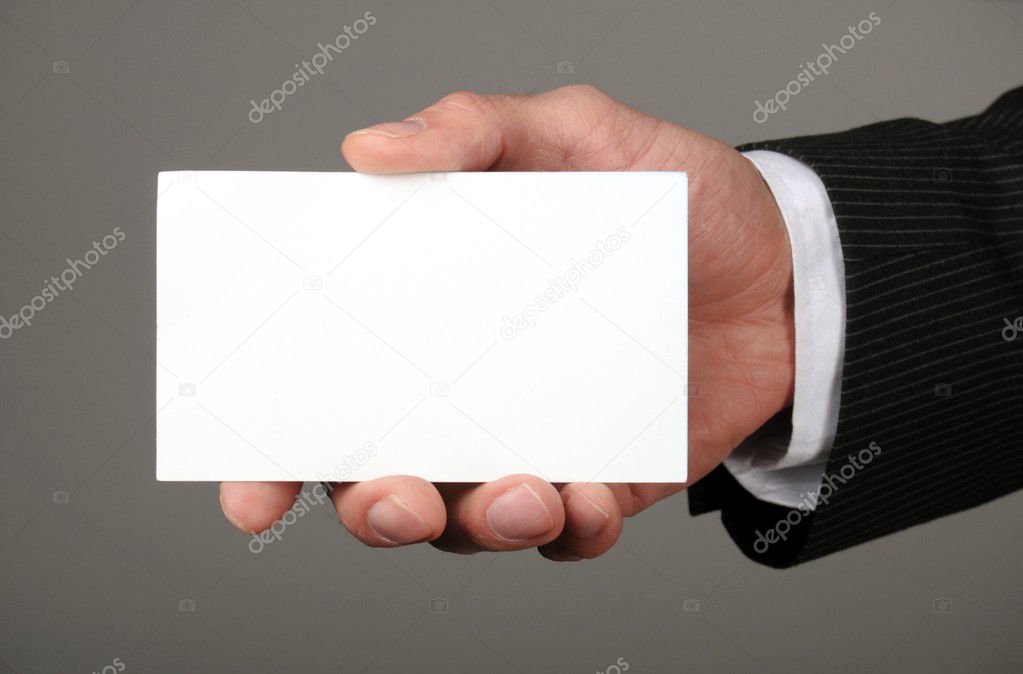 Business man offering card