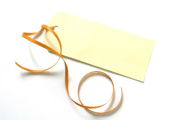Orange ribbon with label — Stock Photo, Image