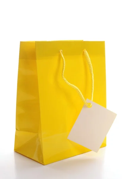 Yellow shopping bag — Stock Photo, Image