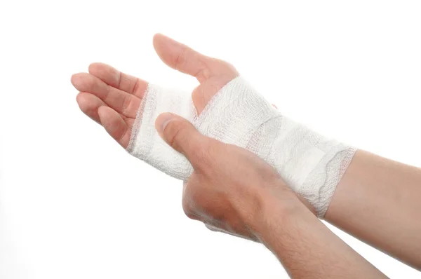 Bandage på en hand — Stockfoto