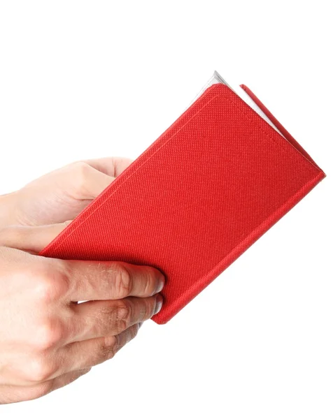 Buch in der Hand aufgeschlagen — Stockfoto