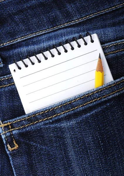 Notebook in jeans pocket — Stock Photo, Image