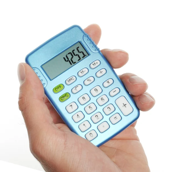 Рука с калькулятором — стоковое фото