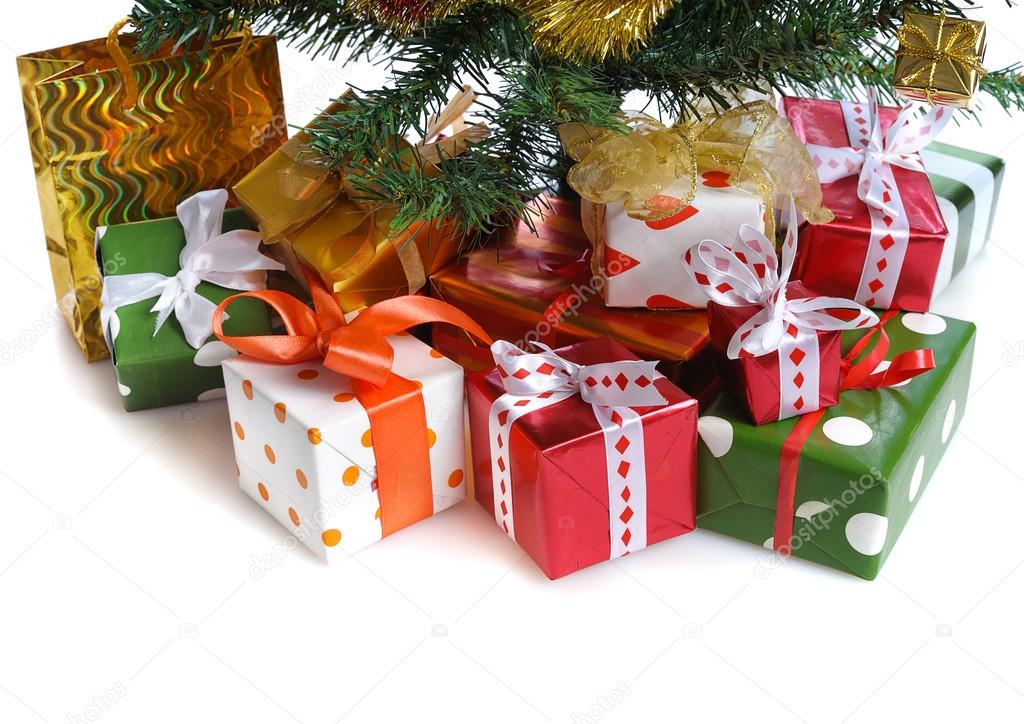 Red gift boxes under Christmas tree — Stock Photo © natlit 13913657