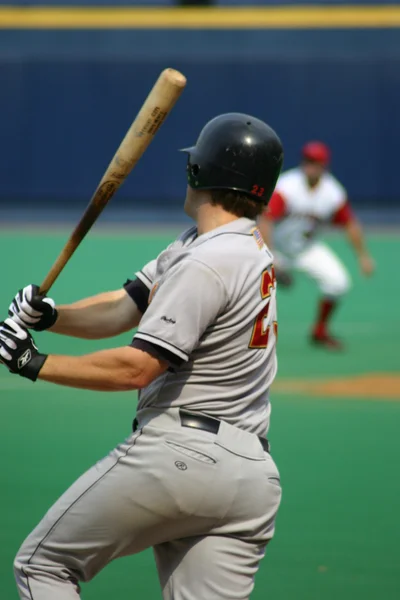 Baseball batter swinging