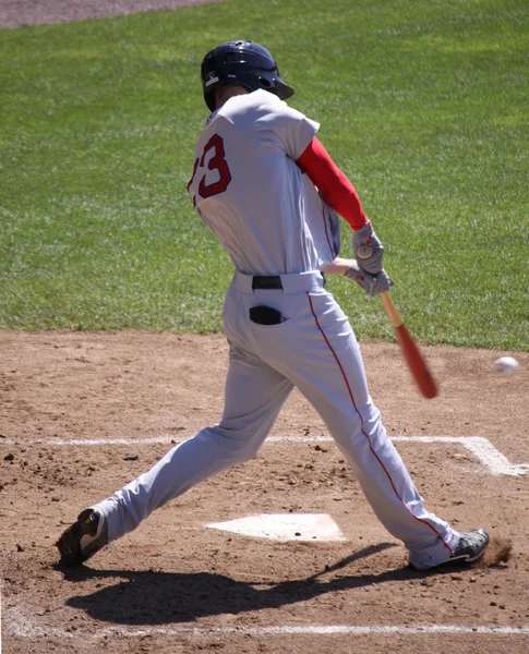 Baseball batter swinging