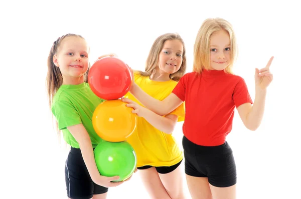 Meninas com bolas coloridas — Fotografia de Stock