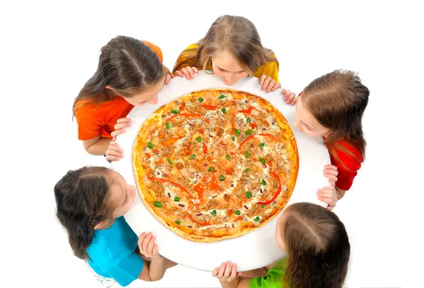 Children eating huge pizza — Stock Photo, Image