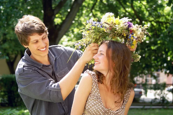 Happy young couple with diadem — Stock Photo, Image