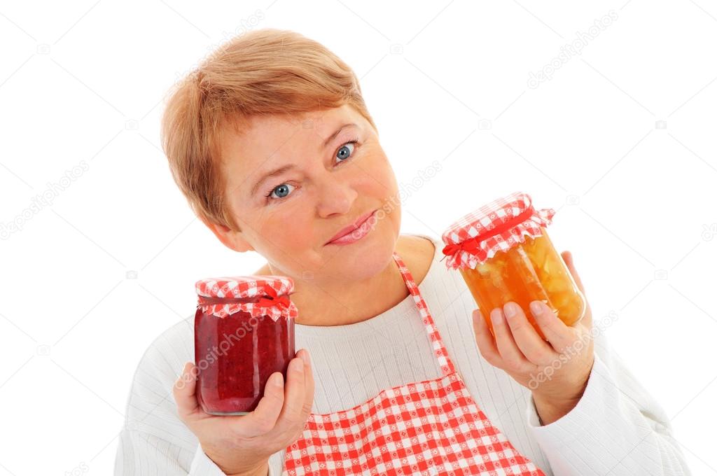 Woman cutting fruit and canning
