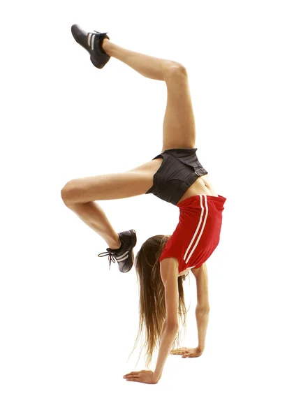 Flexibele meisje in gymnastische pose — Stockfoto