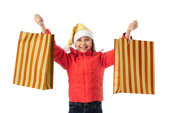 Christmas girl with gift bags Stock Image