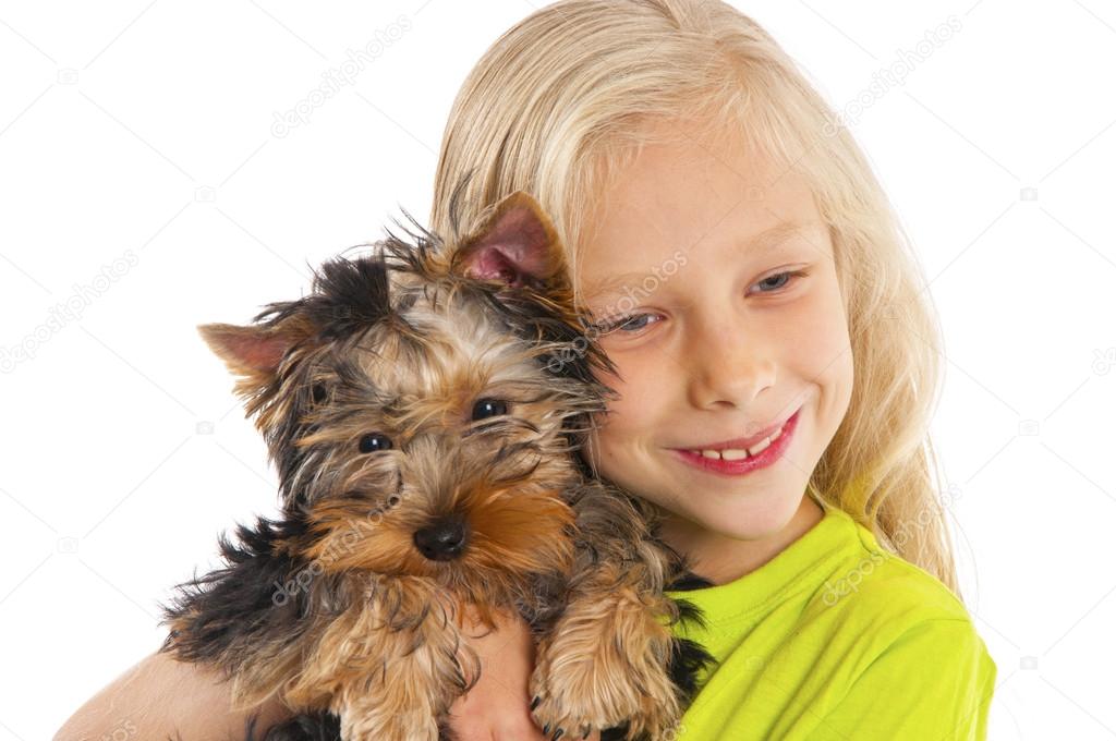 Happy child playing with dog