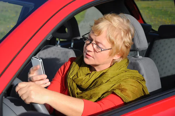 Woman talking on tablet phone