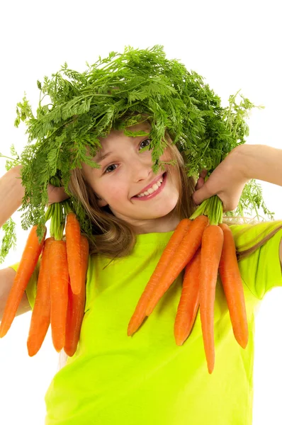 Menina engraçada com cenouras frescas — Fotografia de Stock